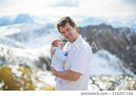 Family with kids hiking in the mountains 118267188