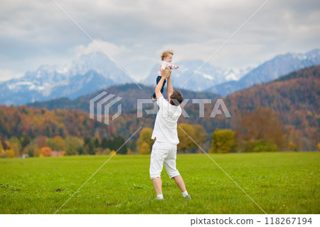 Family with kids hiking in the mountains Family with kids hiking in the mountains 118267194