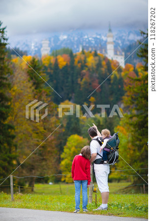 Family with kids hiking in the mountains Family with kids hiking in the mountains 118267202