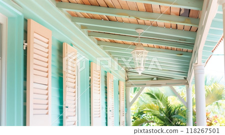 Colonial archivolts, wooden beams, and pastel surfaces evoke historical charm and seaside serenity. Colonial archivolts, wooden beams, and pastel surfaces evoke historical charm and seaside serenity. 118267501