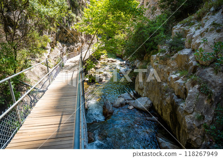 Sapadere canyon with wooden paths and cascades of waterfalls in the Taurus mountains near Alanya, Turkey 118267949