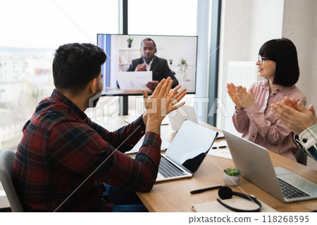 Team video conference call celebrating achievement online 118268595