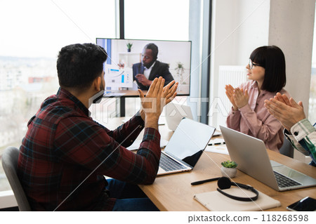 Business team clapping during video conference meeting Business team clapping during video conference meeting 118268598
