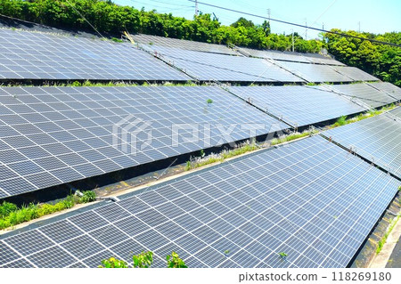 A mega solar power plant built on the slope of a mountain A mega solar power plant built on the slope of a mountain 118269180