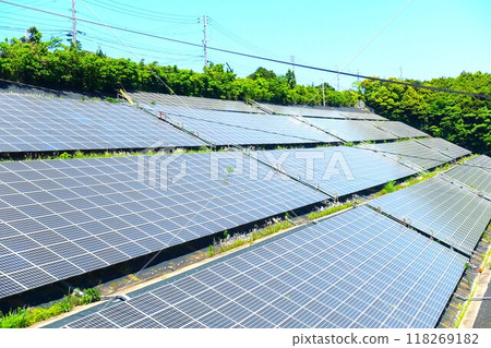 A mega solar power plant built on the slope of a mountain A mega solar power plant built on the slope of a mountain 118269182