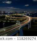 A highway where the traces of cars passing by can be seen with lights 118269274