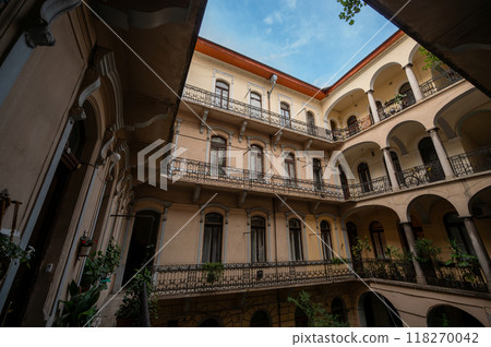 Budapest, Hungary. August 24, 2022. A railing house in the historic center: the gallery balcony goes all the way around the internal courtyard. 118270042