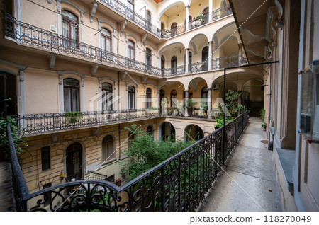 Highway to Budapest, Hungary. August 24, 2022. A railing house in the historic center: the gallery balcony goes all the way around the internal courtyard. 118270049