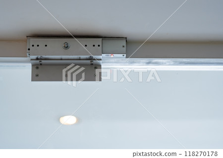 An electromagnetic lock, a maglock or electromagnet lock, is a type of locking device that uses an electromagnet to secure a door in place. It is often mounted on glass doors. An electromagnetic lock, a maglock or electromagnet lock, is a type of locking device that uses an electromagnet to secure a door in place. It is often mounted on glass doors. 118270178
