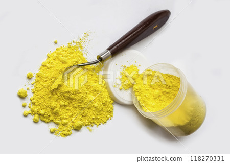 Cadmium Yellow pigment on a white background 118270331