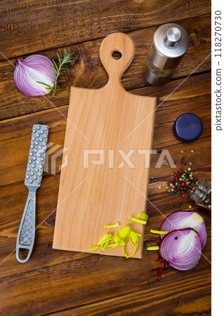 Spices frame on wooden table 118270730