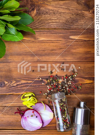 Spices frame on wooden table 118270734