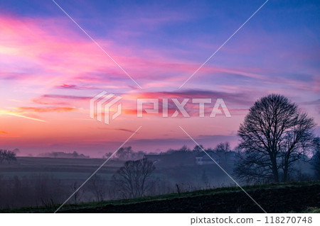 sunset in the field. beautiful autumn foggy landscape in Ukraine sunset in the field. beautiful autumn foggy landscape in Ukraine 118270748