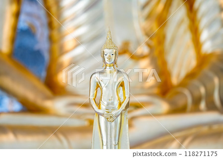 Golden Buddha statue serves as a symbol for the Lord Buddha. for adoration and reverence among Buddhists 118271175