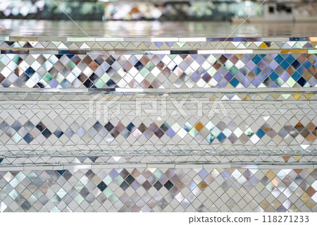 Buddhist Temple pillars and bas of pillars are decorated with Mosaic mirror. Traditional Thai temple pillar decorated with beautiful mosaic pattern inside the Buddhist temple. Buddhist Temple pillars and bas of pillars are decorated with Mosaic mirror. Traditional Thai temple pillar decorated with beautiful mosaic pattern inside the Buddhist temple. 118271233