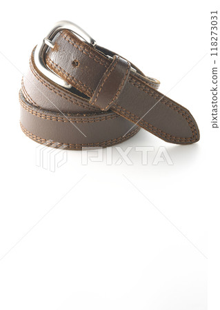 Brown belt photographed on a white background Brown belt photographed on a white background 118273031