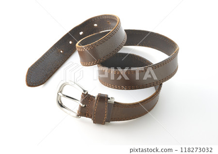 Brown belt photographed on a white background Brown belt photographed on a white background 118273032