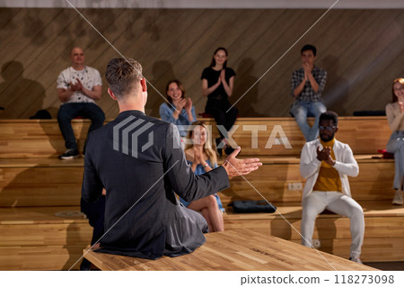 Group Of Multi-ethnic People Clapping Hands After Speaking Of Man Couch Professor Group Of Multi-ethnic People Clapping Hands After Speaking Of Man Couch Professor 118273098