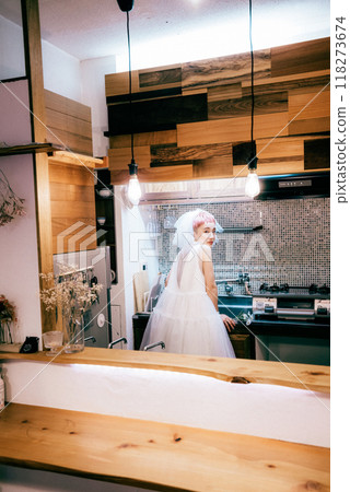 Bride working in the kitchen 118273674