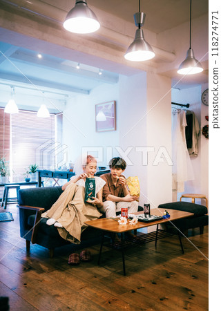 Bride and groom having a home party Bride and groom having a home party 118274771