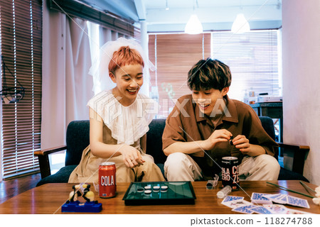 Bride and groom having a home party 118274788