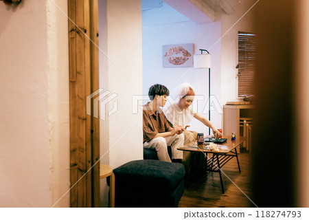Bride and groom having a home party Bride and groom having a home party 118274793