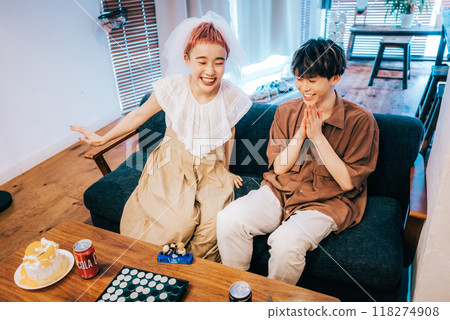 Couple enjoying a date at home Couple enjoying a date at home 118274908