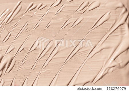 Face foundation texture, beautiful unusual beige abstract background. Face foundation texture, beautiful unusual beige abstract background. 118276079