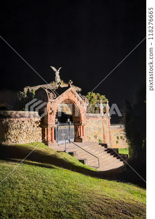 Night view of the famous gothic cemetery of Comillas in Cantabria, Spain. 118276665
