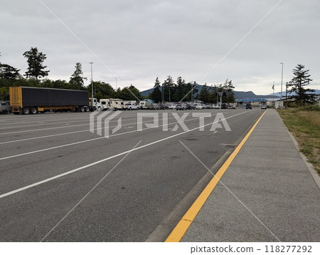 Anacortes, Washington, USA - 06.26.2024: A line of vehicles at the Anacortes port ferry terminal 118277292