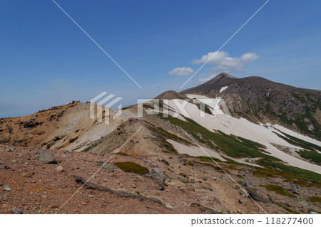 Tokachi Mountain with remaining snow on it - A trail from Mt. Kamihorokametoku 118277400