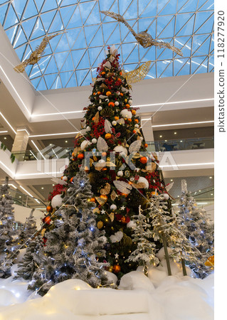 Image of big decorated Christmas tree in the Triniti shopping mall. Image of big decorated Christmas tree in the Triniti shopping mall. 118277920