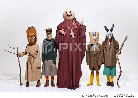 Five Halloween characters standing together in creepy costumes and masks., isolated on white background. Vintage Halloween horror Five Halloween characters standing together in creepy costumes and masks., isolated on white background. Vintage Halloween horror 118278122