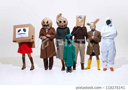 Group of people, family and friends wearing creepy homemade costumes isolated on white background. Creepy season. Group of people, family and friends wearing creepy homemade costumes isolated on white background. Creepy season. 118278141