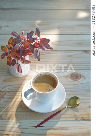 White coffee cup and Red Amaranth Microgreen vegetable  on wooden table with sunlight 118278492