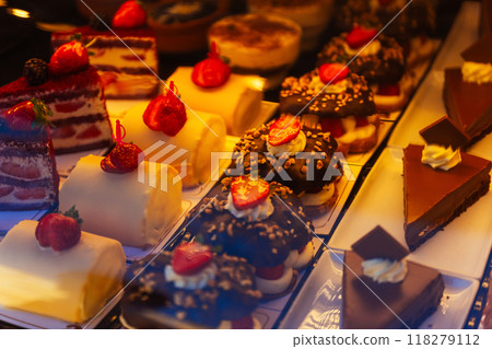 Turkish popular desserts with strawberries in a row on the counter in Turkey Turkish popular desserts with strawberries in a row on the counter in Turkey 118279112