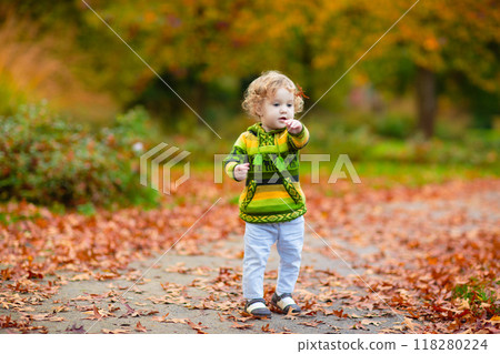 Kids playing in autumn park 118280224