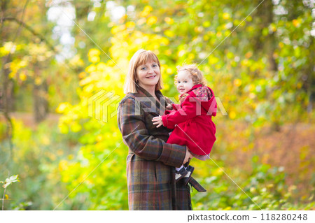 Kids playing in autumn park 118280248