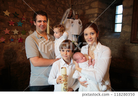 Baptism of newborn baby in Catholic church. 118280350