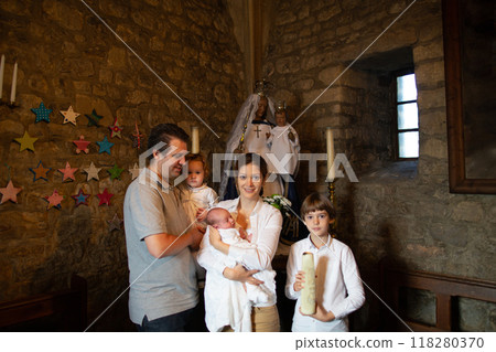 Baptism of newborn baby in Catholic church. 118280370