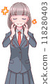 Annoyed schoolgirl in uniform holding her hand on her cheek 118280403