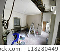Room under renovation with exposed wires and tools 118280449