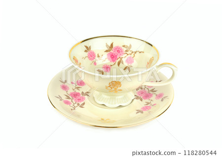 Vintage porcelain cup and saucer isolated on white. Vintage porcelain cup and saucer isolated on white. 118280544