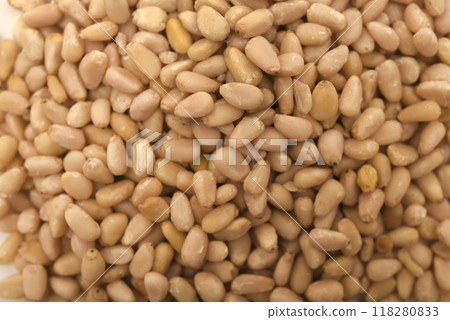 Pine nuts in close-up. Hazelnuts. Pine nuts in close-up. Hazelnuts. 118280833