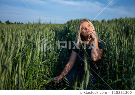 Contemplating Harvest: A Farmer's Moment of Reflection 118281300