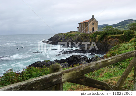 Hermitage of Saint Catherine: Coastal Church on a Cliff Amidst Ocean Waves Hills Hermitage of Saint Catherine: Coastal Church on a Cliff Amidst Ocean Waves Hills 118282065