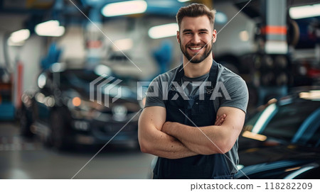 Smiling mechanic in auto repair shop Smiling mechanic in auto repair shop 118282209
