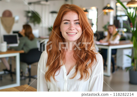 Smiling woman with red hair in modern office Smiling woman with red hair in modern office 118282214