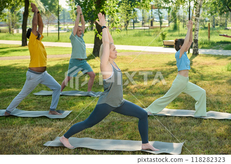People stretching legs and raising arms People stretching legs and raising arms 118282323