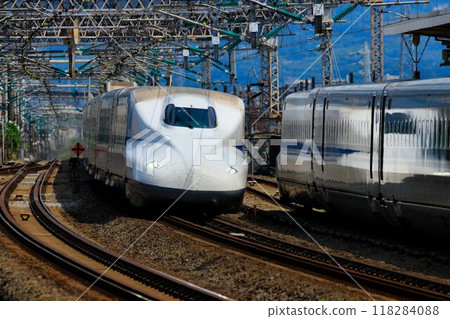 The N700A series runs along the Tokaido Shinkansen, Japan's main artery... at Odawara Station The N700A series runs along the Tokaido Shinkansen, Japan's main artery... at Odawara Station 118284088